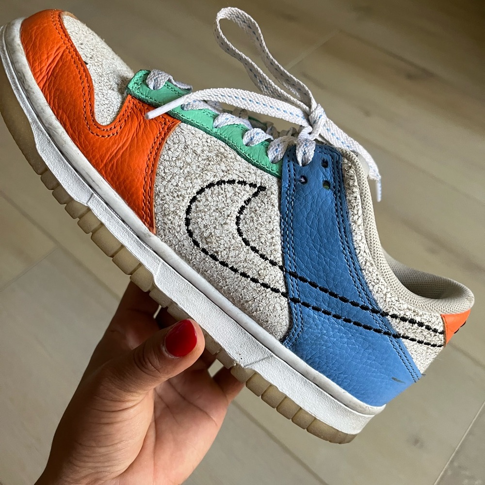 Nike Orange and Blue Sneakers with Classic Dunk Design